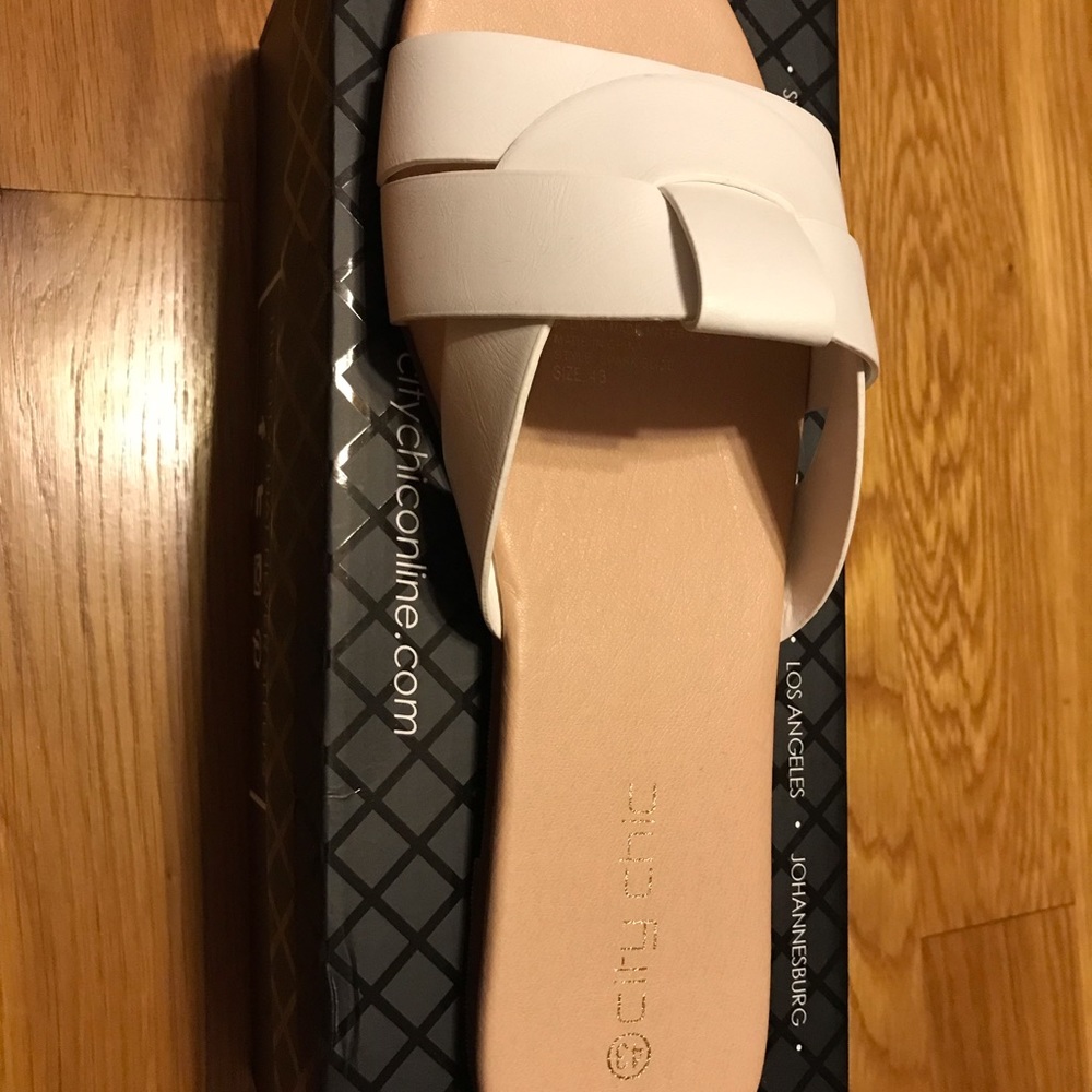 New in box, two pair City Chic Spark Slides. size 11 (43).  never worn
